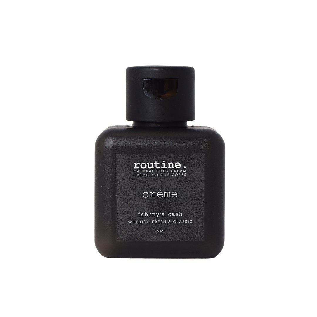 Routine | Natural Body Cream - Johnny's Cash | Travel Mini Product Image - mini black bottle shown on a white background