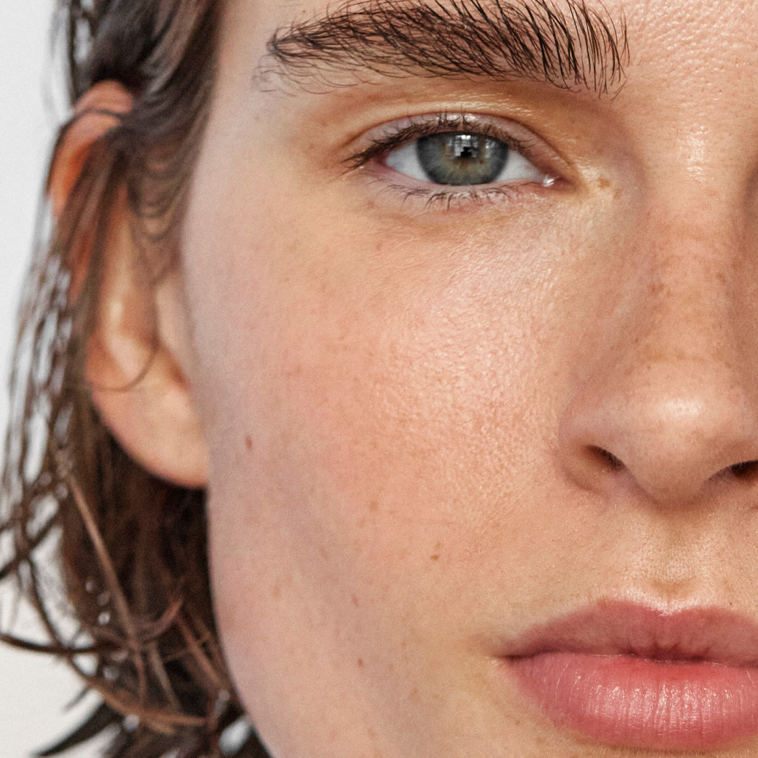 True Botanicals | A True Transformation Kit | Model Image - close-up of a model with fresh, glowing skin