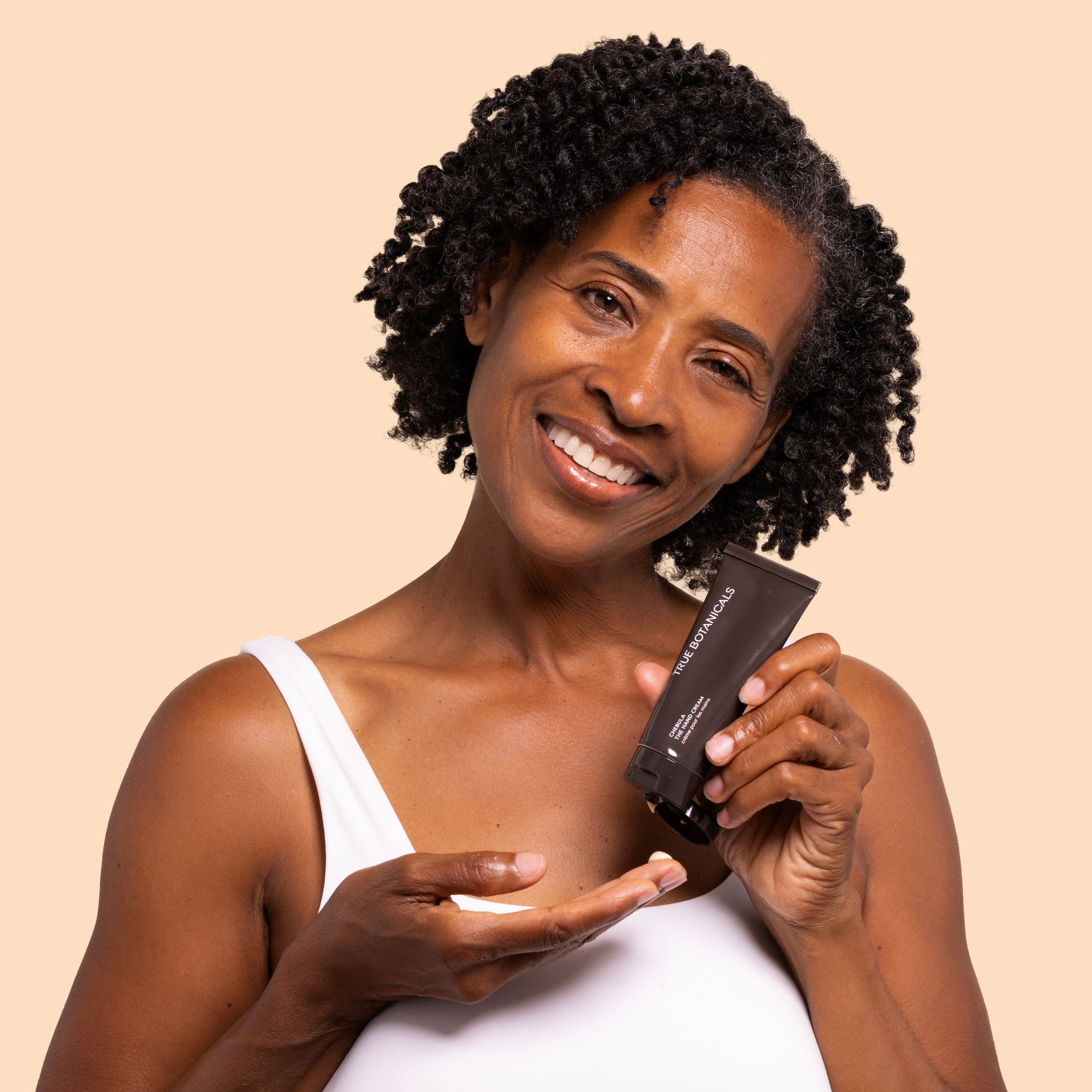 True Botanicals Chebula Hand Cream with Model