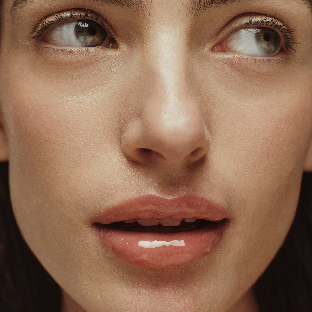 True Botanicals | Lipid Lip Hydrating Lip Oil | Model Image2 - close-up of glossy, hydrated lips