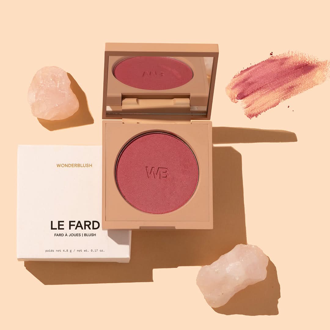 Wonderblush | Le Fard Blush | Styled image with swatch, blush compact with lid open and white outer packaging