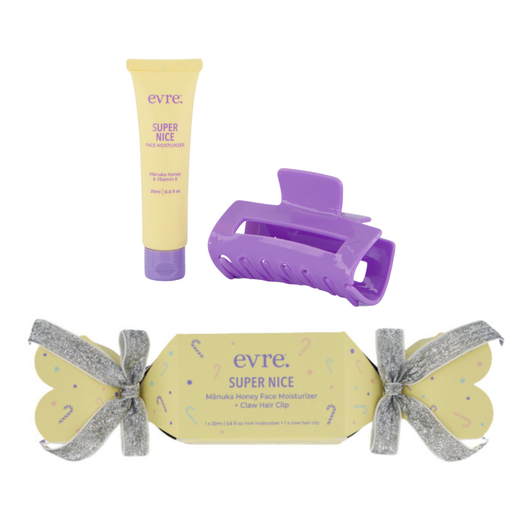 evre. | Super Nice Moisturizer Xmas Cracker + Claw Hair Clip | Product Image - moisturizer, purple claw hair clip, and festive cracker packaging on a white background