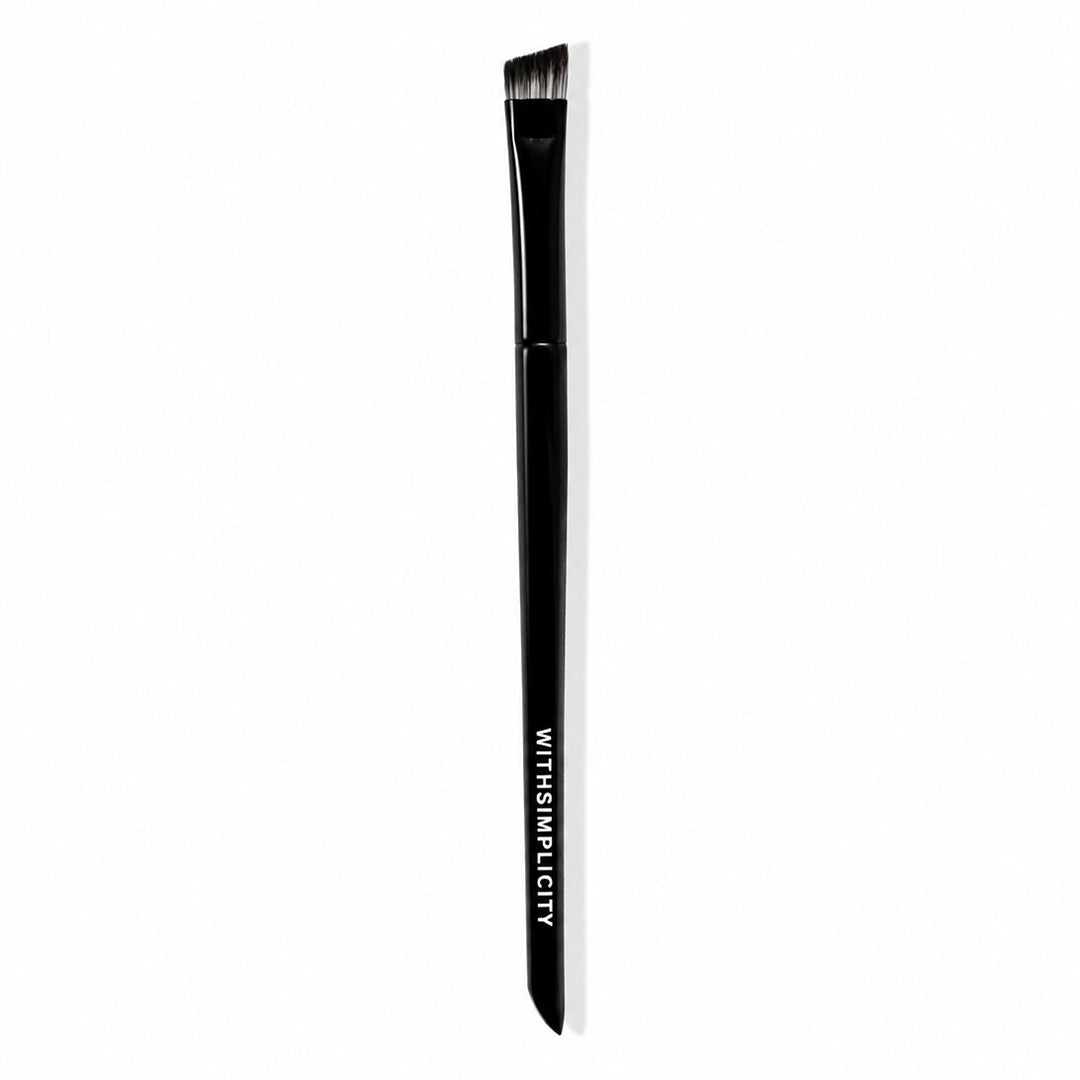 withSimplicity | Angled Liner Brush | Product Image - angled liner brush with short, slanted black bristles and a slim black handle on a white background